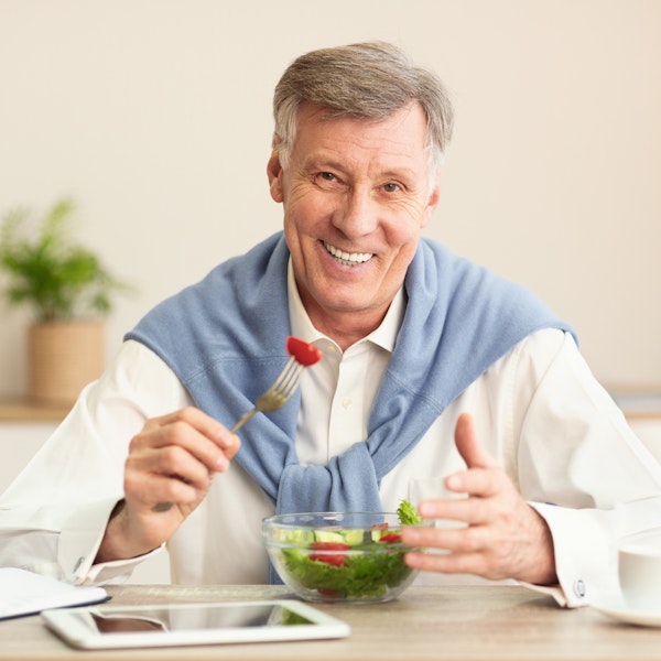 Man eating salad