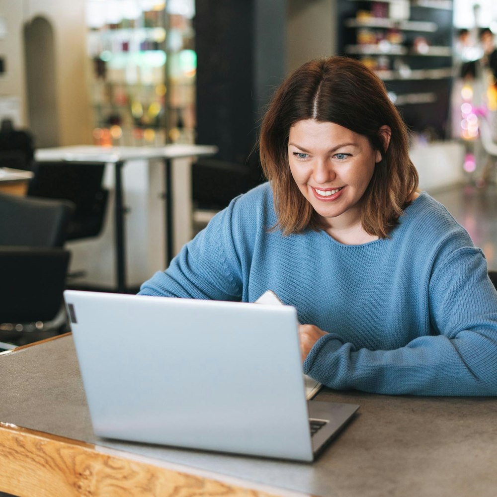 Woman on laptop for virtual consultation